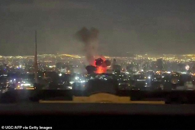 This video grab taken from UGC images posted on social media on March 1, 2026 shows an explosion following a strike on Tehran that appears to have occurred near state television channel IRIB