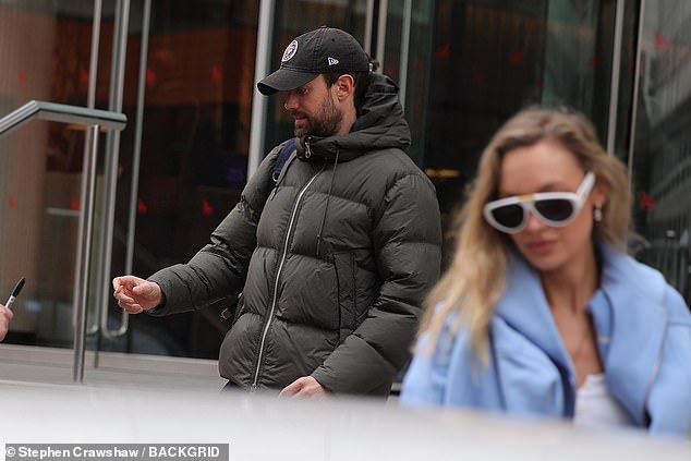 Jack wrapped up in a padded jacket and jogging bottoms as he exited the hotel, hiding his face under a baseball cap