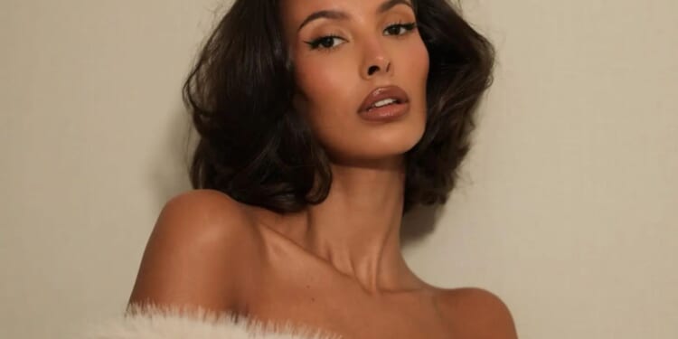 Maya Jama poses nude except for fur stole after stunning on Brit Awards red carpet in figure hugging white dress