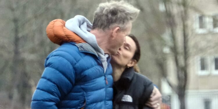 Gordon Ramsay enjoys kiss from wife Tana on loved-up stroll after wading into pal David Beckham's feud with son Brooklyn