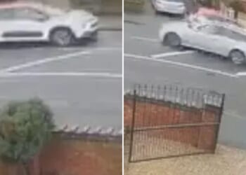 Moment driver smashes into car leaving 'screaming' woman trapped inside as cops hunt motorist who fled the scene