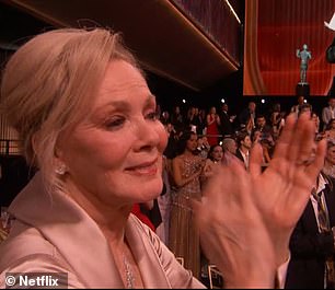 Smart looked emotional while applauding