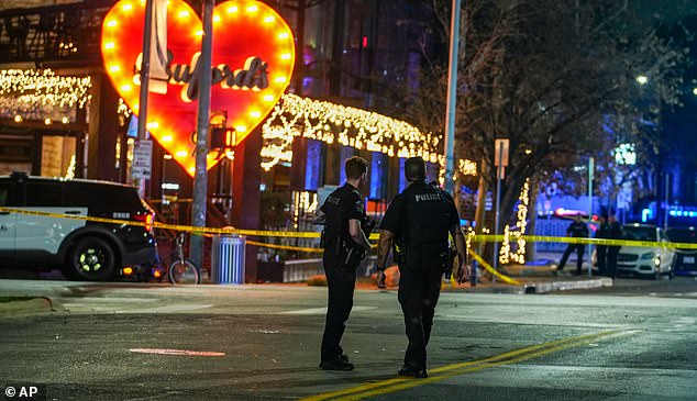 Two people were shot dead and 14 more were wounded at a packed-out bar in Austin during the early hours of Sunday, before officers killed the attacker in return fire