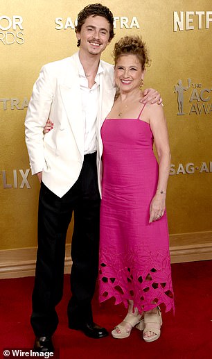 At one point, he shared a sweet moment with his mom as he draped his arm around her shoulders as they paused for memorable snaps together