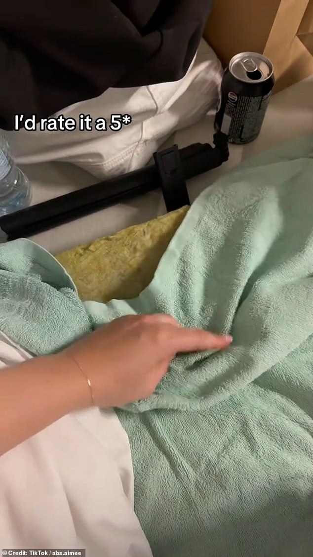 Numerous videos posted on social media show a scattering of holidaymakers across the floors of several car parks, lying on mattresses or just a thin blanket