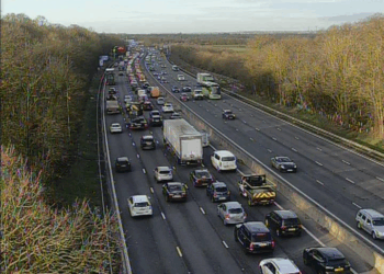 M4 grinds to a halt after crash between van and car as drivers warned of 25-minute delays and 3 miles of congestion