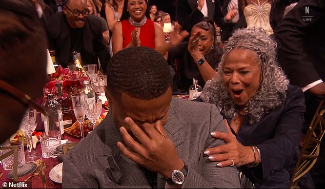 When his name was announced, it was his mother Donna who had a shocked look on her face as she joyfully grabbed his shoulders