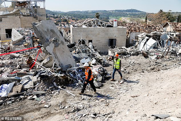 Debris lies at the site of a fatal Iranian missile strike in Beit Shemesh, Israel on March 2