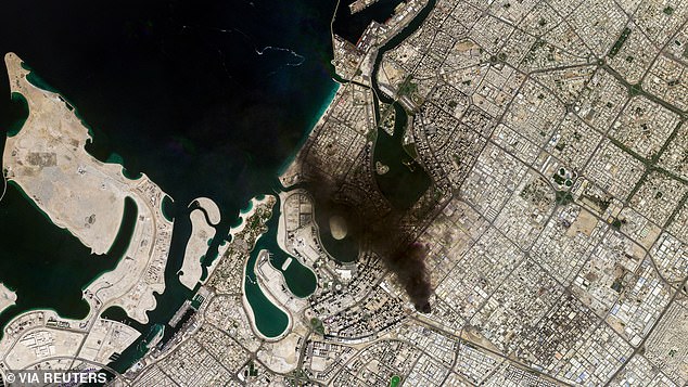 A satellite image of an industrial area covered in smoke in Dubai, UAE on March 1