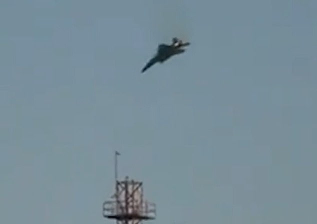 An American F-15 jet spirals towards the ground over Kuwait