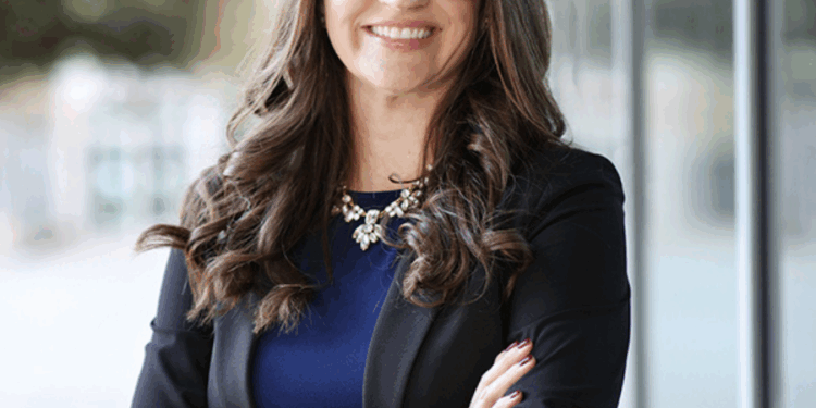 Rachel Slaymaker smiling in headshot.
