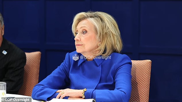 Livid Hillary Clinton looks on as her lawyer explains the breach in protocol after her photo was leaked