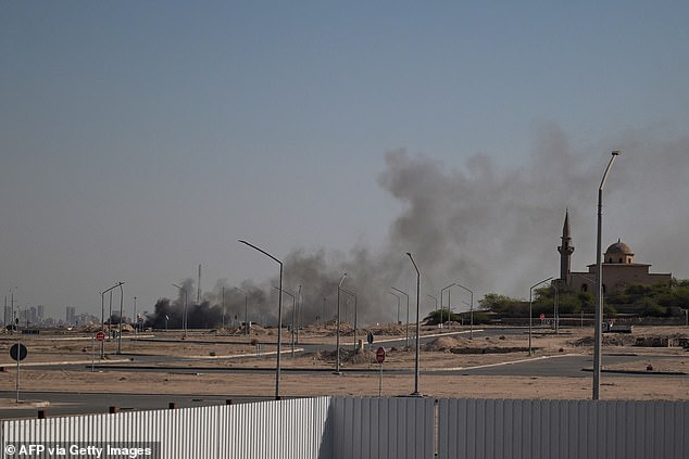 Smoke rises from a reported Iranian strike in the area where the US Embassy is located in Kuwait City on Monday. The US has hit Iran hard in the last 24 hours