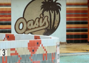 Leisure centre ‘inspiration for Oasis’ band name’ has sat abandoned for years… now it's covered in grime & overgrown