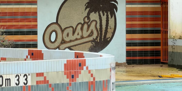 Leisure centre ‘inspiration for Oasis’ band name’ has sat abandoned for years… now it's covered in grime & overgrown
