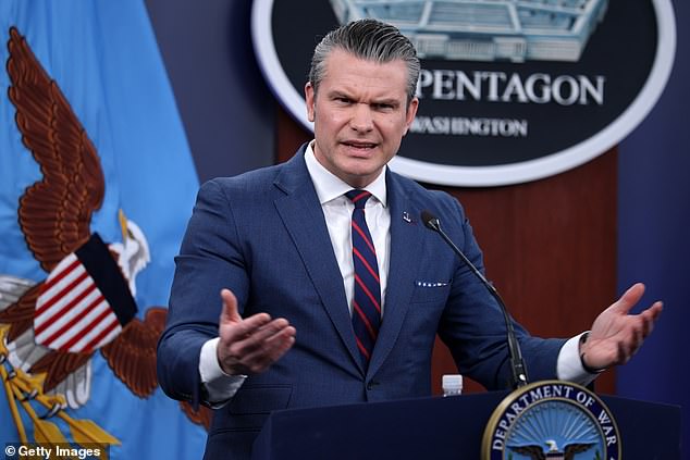US Secretary of War Pete Hegseth (pictured at a news conference on Monday) praised Israel for its central role in the offensive – but savaged the legalistic approach taken by Britain and other European allies