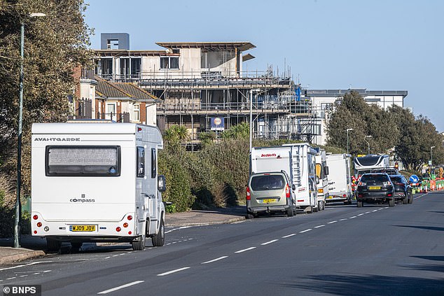 Locals argue that the 20 vehicles which have settled on a cliff-top road at Boscombe and Southbourne, Bournemouth, are turning 'what was once a scenic, peaceful stretch of coastline into an unmanaged long-stay parking zone'