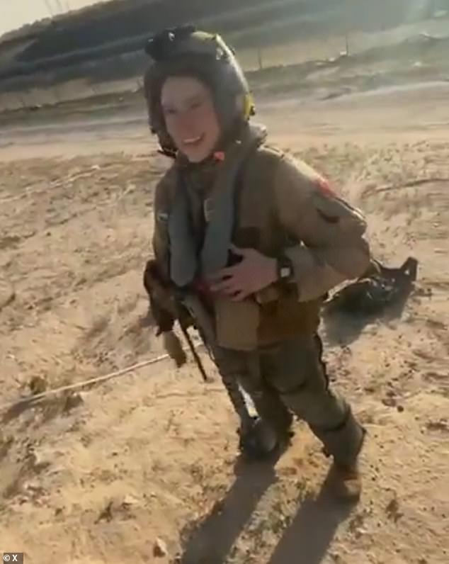 The unknown female pilot beamed ear-to-ear despite being shot out of the sky moments before in a friendly fire mishap