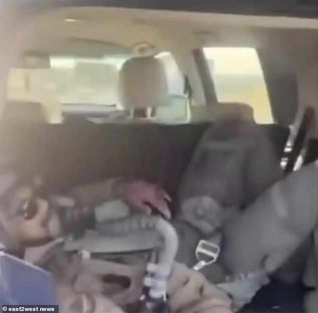 One of the pilots was transported to safety in the boot of a car after ejecting from the spiraling plane