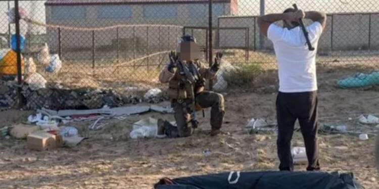 Shocking moment US Top Gun pilot is nearly battered by pipe-wielding local after surviving Kuwait fighter jet crash