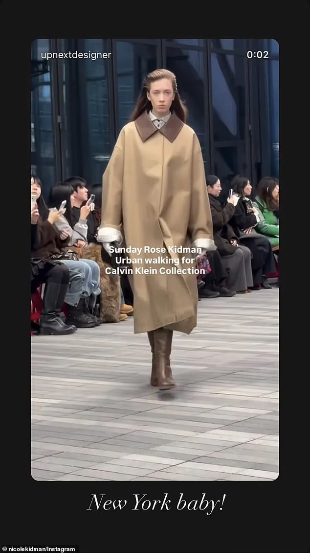 The teen, who is the daughter of Kidman and Keith Urban , wore an oversized beige trench coat with large brown leather lapels, worn over a buttoned-up shirt, as she walked the runway