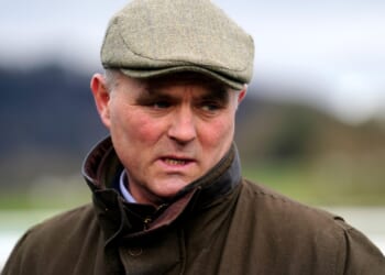 Top Grand National horse trainer 'broke OAP dogwalker's arm after battering him with hockey stick in trespassing mishap'