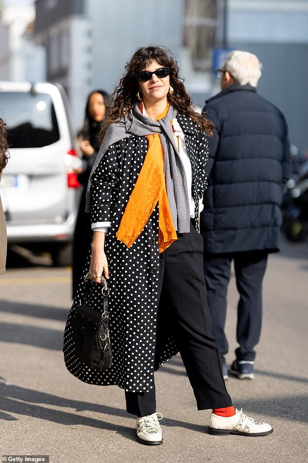 A polka dot coat looks great with colour pop accessories.