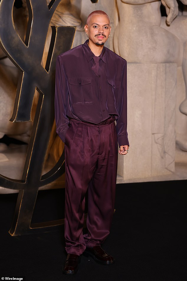 Evan Ross looked trendy in a purple satin trouser and shirt look