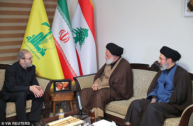 Mojtaba (pictured with his father), is not a high-ranking cleric and has no official role in the regime