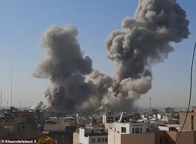 Smoke billowing into the sky above Khamenei's compound on Pasteur Street in the heart of Tehran