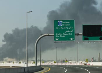 A plume of smoke rises from the port of Jebel Ali Sunday following an Iranian strike in Dubai, United Arab Emirates. News outlets reported Tuesday that a new strike targeted the U.S. consulate compound in the city.
