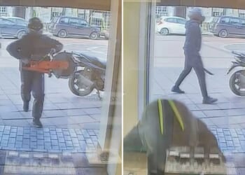 Dramatic moment robbers use chainsaw and machete to smash into high street jewellers & steal pricey gems before fleeing