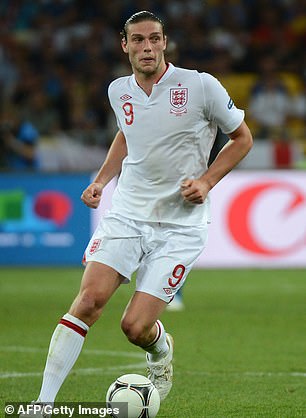 Andy earned nine England caps during his career. He is pictured playing for the Three Lions during the Euro quarter-final match against Italy in 2012