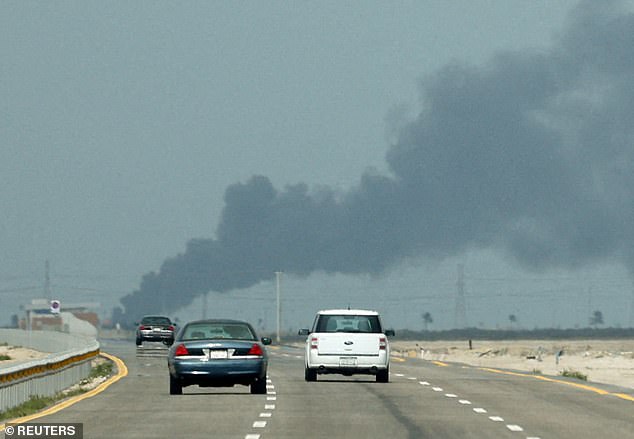 Smoke billows from a Saudi Arabian site reportedly struck by an Iranian missile