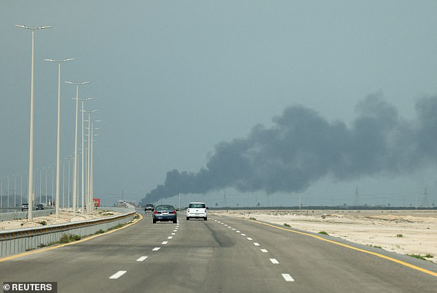 Smoke billows from Saudi Aramco's Ras Tanura oil refinery after a reported Iranian drone strike in Saudi Arabia