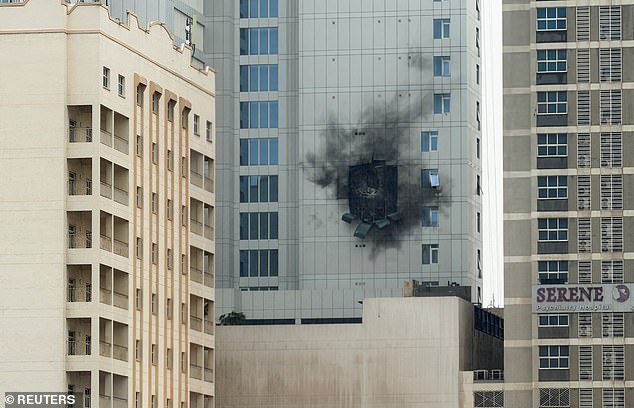 Damage caused by an Iranian drone strike at one of the buildings next to the headquarters of the US Navy base in Juffair