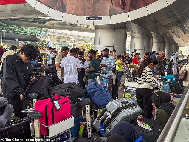 Tourists and locals living in Dubai were seen scrambling to leave at Dubai International Airport