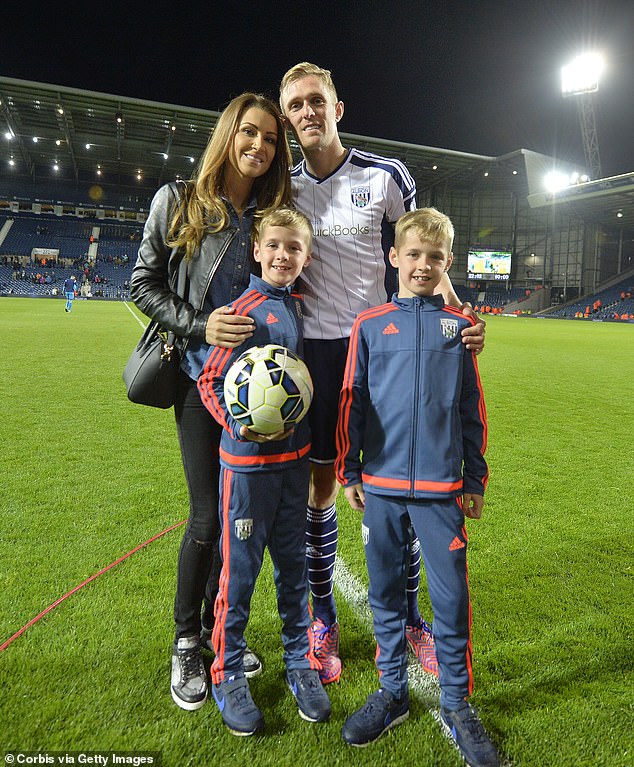 Dad Darren is pictured with his two sons and wife Hayley while playing for West Brom
