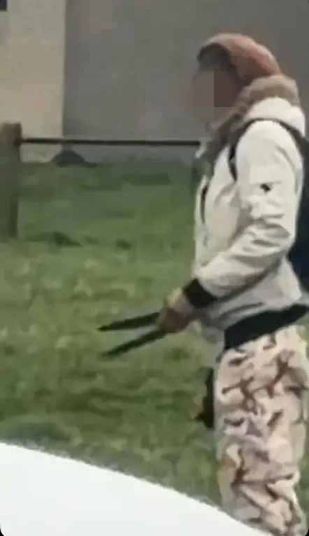 Neighbours said that the knifeman was 'covered in blood' and had ransacked a local shop