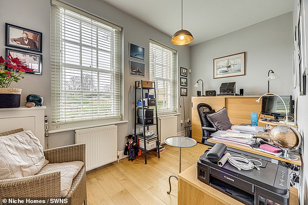 The property also features a home office area and separate utility room
