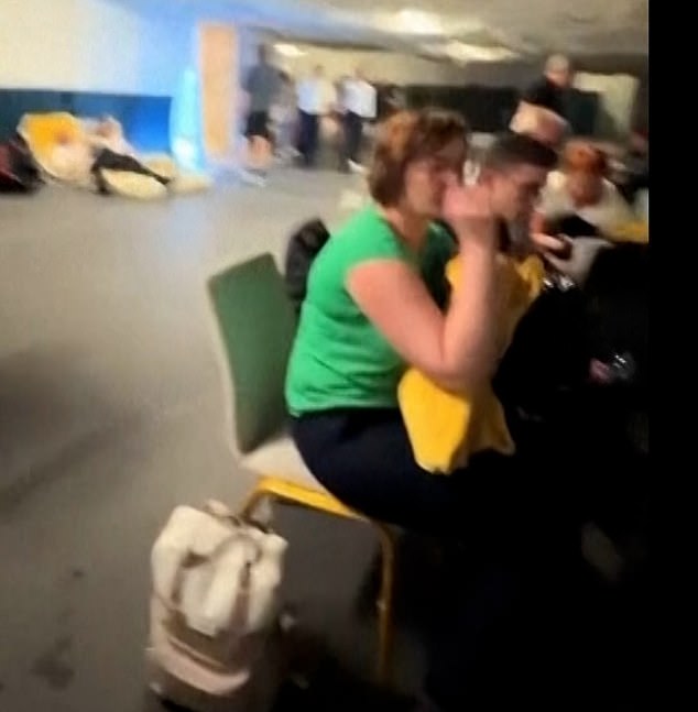 British content creator Mia Plainer said people were 'literally grabbing their Hermes and Chanel bags' as hotels evacuated hundreds of guests into basements while Iranian missiles streaked across the sky