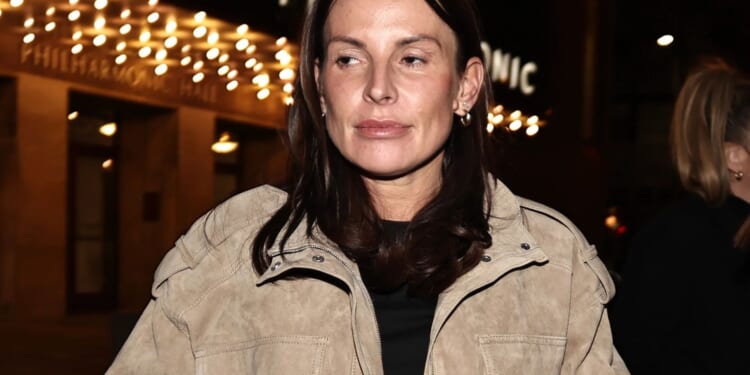 Coleen Rooney lets her hair down at Lily Allen gig after husband Wayne's boozy night out with two women at Brits party