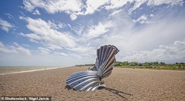 An artistic sculpture rising from the shingle at Aldeburgh Beach, Suffolk