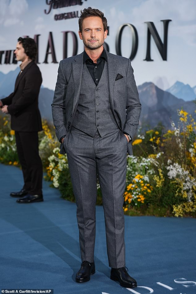 Patrick J. Adams cut a dapper figure in a three-piece grey suit