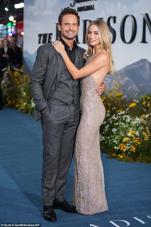 Patrick and Elle cosied up for a photo on the red carpet