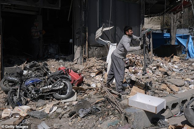 Major General Tomer Bar said 'hundreds of targets of the Iranian regime' have been struck by missiles - and also appeared to suggest that Israeli troops have been deployed on the ground in Iran