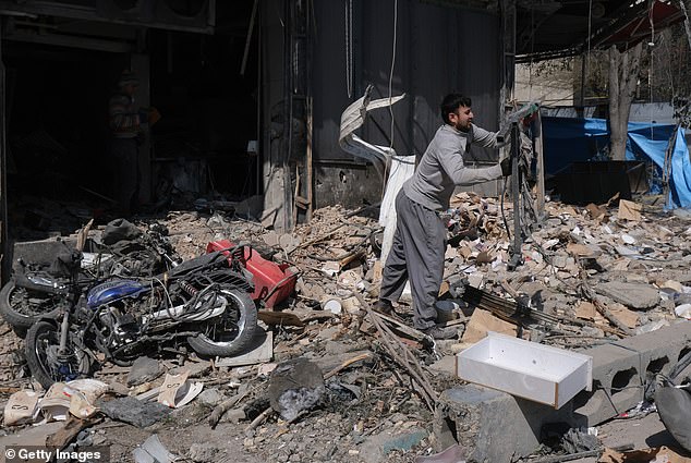 Major General Tomer Bar said 'hundreds of targets of the Iranian regime' have been struck by missiles - and also appeared to suggest that Israeli troops have been deployed on the ground in Iran