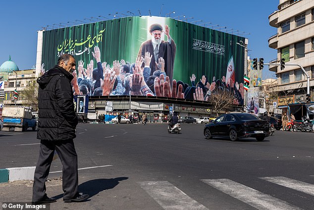 A funeral ceremony for Iran's Supreme Leader Ayatollah Ali Khamenei was cancelled on Wednesday (Pictured: A banner of the leader in Tehran)