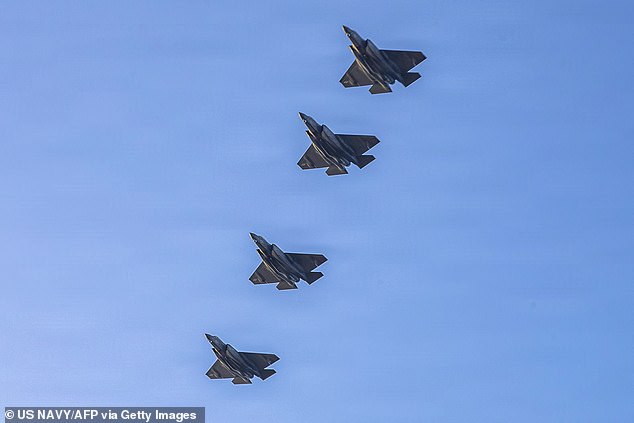 US Navy F-35 Lightning II aircraft flying over the flight deck of Nimitz-class aircraft carrier USS Abraham Lincoln (CVN 72) in support of Operation Epic Fury on March 3