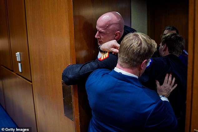 A Republican Senator and former Navy SEAL restrained a radical leftist ex-Marine who came to the Capitol to heckle Republicans over Donald Trump's strikes in Iran